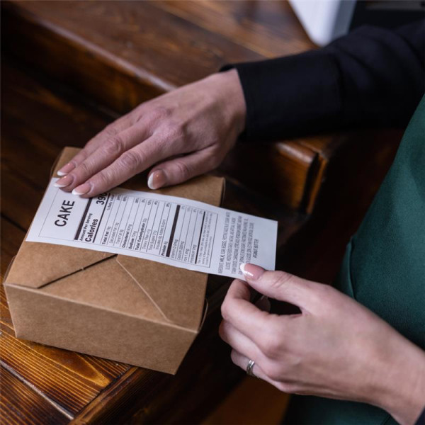 Η έκδοση 123ink αντικαθιστά την ταινία συνεχούς χαρτιού Brother DK-22205 Black on Orange 080806 - 2